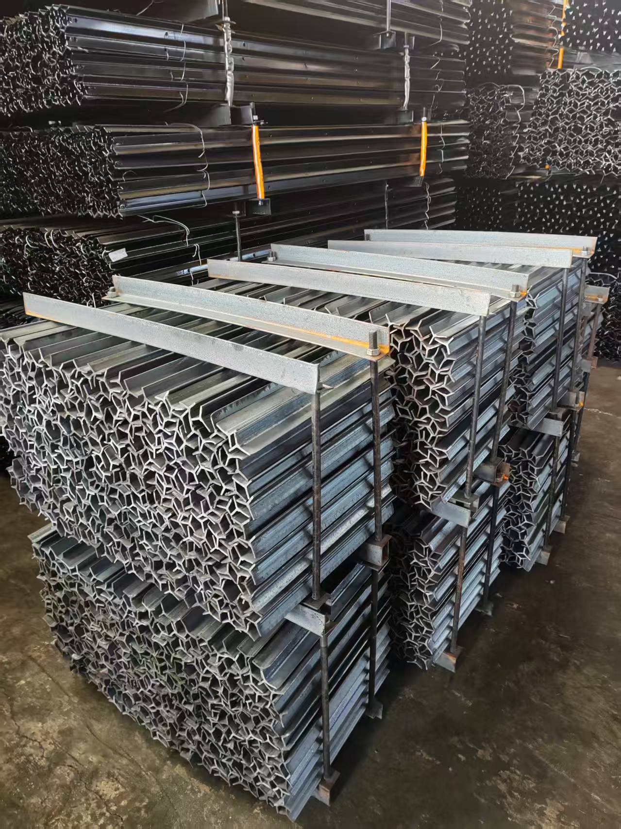 Galvanised star droppers stacked at the depot ready for container loading